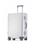 POSHPOSH Aluminium Trunk suitcase in anodised aluminium, side view with extended telescopic handle