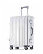POSHPOSH Aluminium Trunk suitcase in anodised aluminium, side view with extended telescopic handle