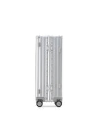 POSHPOSH Aluminium Cabin suitcase in anodised aluminium, rear view showing the vertical shell seam with dual PP monogram hinge plates