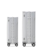 POSHPOSH Aluminium Cabin and Check-In suitcases shown side by side, both in anodised aluminium with matching PP monogram hinge plates
