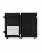 POSHPOSH Aluminium Cabin suitcase interior, open view showing the two mesh-lined compartments and zip pockets on both sides