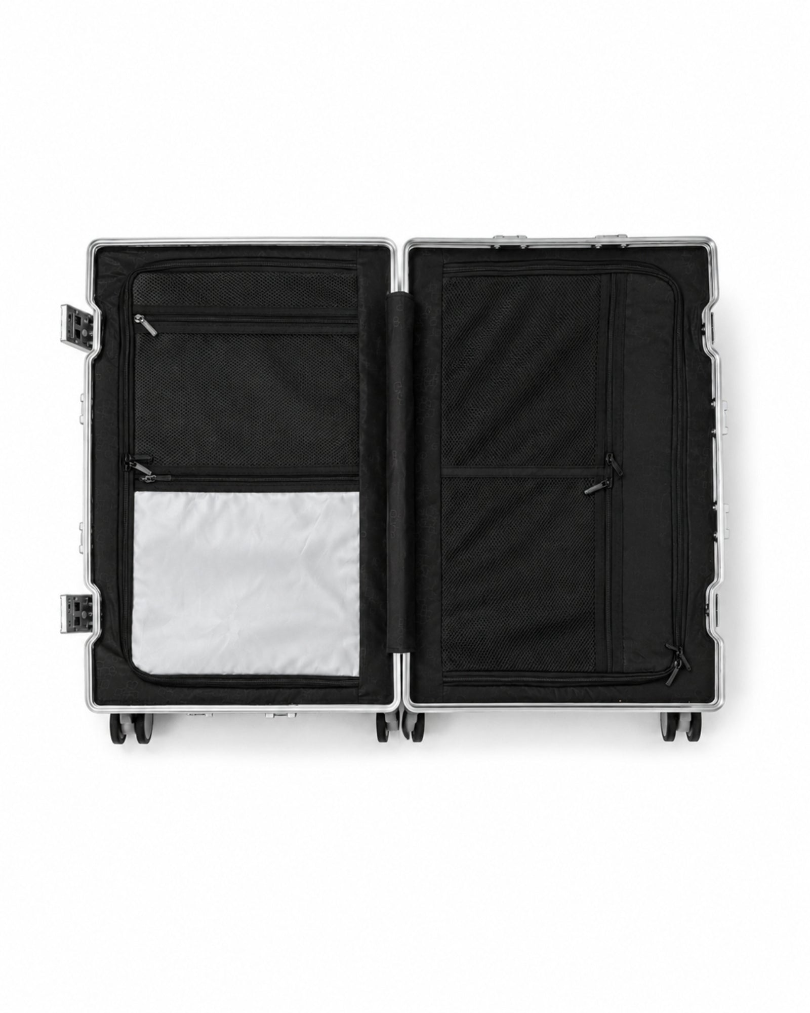 POSHPOSH Aluminium Cabin suitcase interior, open view showing the two mesh-lined compartments and zip pockets on both sides